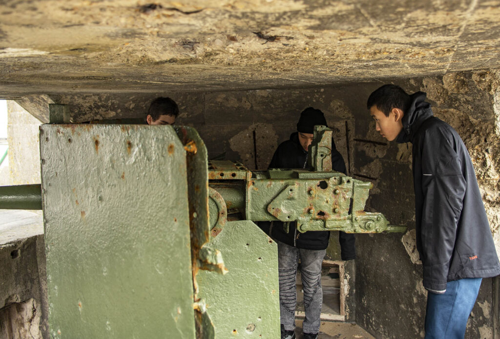 Checking out a gun position on Juno Beach.